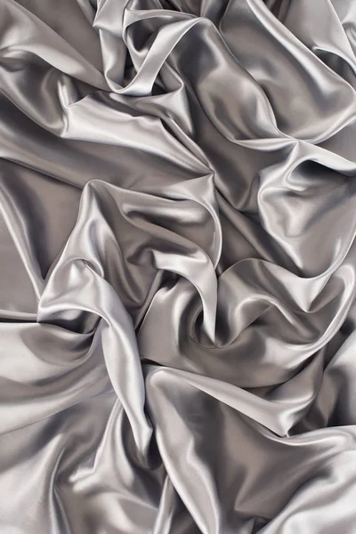 Silver delicate silk fabric background — Stock Photo