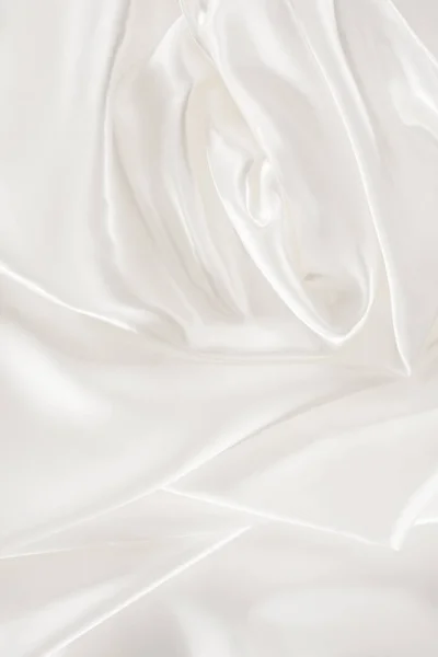 White soft shiny satin fabric background — Stock Photo