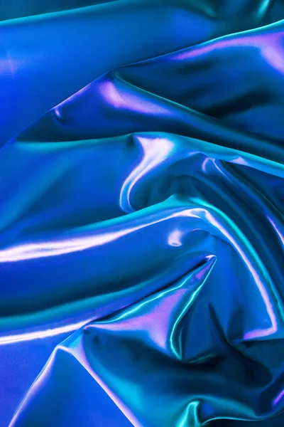Fondo de tela de satén brillante azul y turquesa - foto de stock