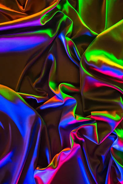 Colorido crumpled brilhante seda tecido fundo — Fotografia de Stock