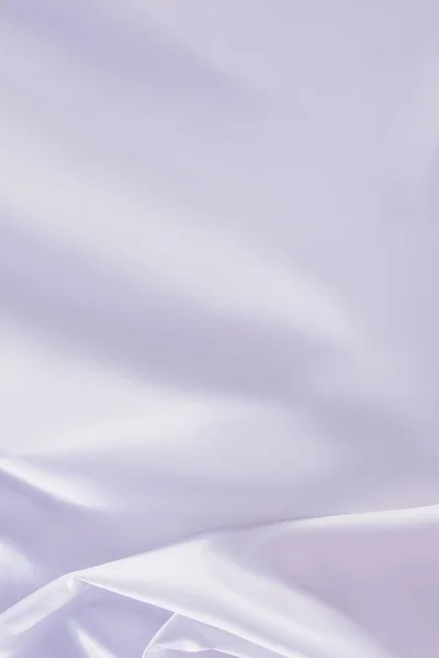 White shiny silk fabric background — Stock Photo