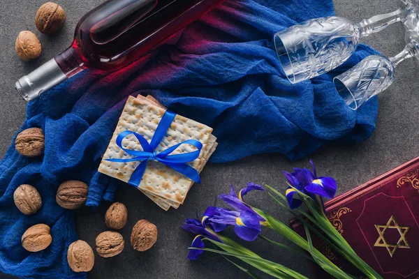 Top view of matza, torah and wine on table, jewish Passover holiday concept — Stock Photo