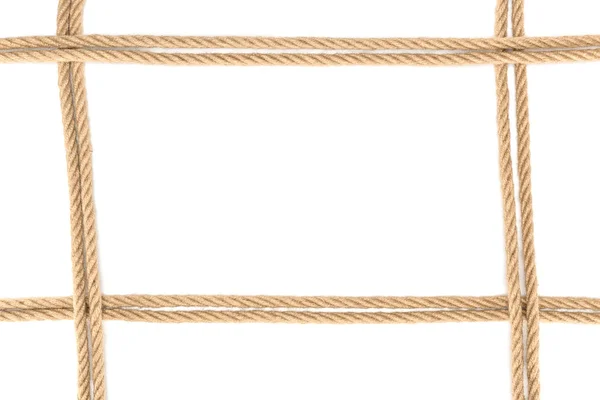 Vista superior de cuerdas náuticas dispuestas aisladas en blanco - foto de stock