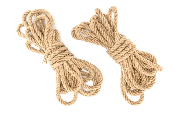 Top view of arranged tied nautical ropes isolated on white — Stock Photo