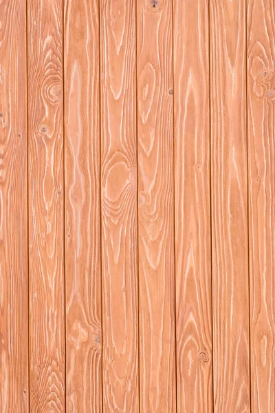 Wooden fence planks background painted in orange — Stock Photo