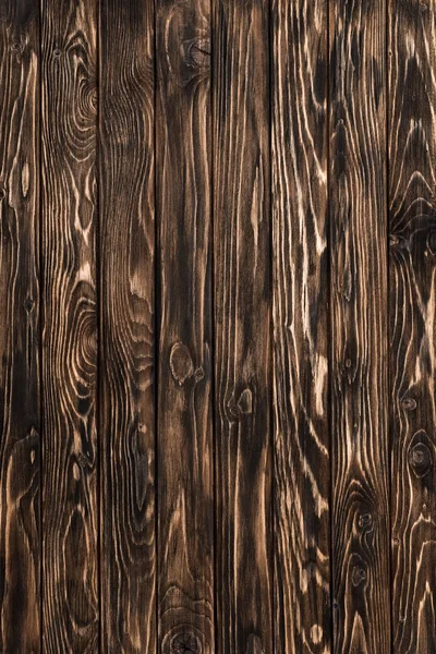 Fondo áspero de la superficie detallada de tablones de madera marrón - foto de stock
