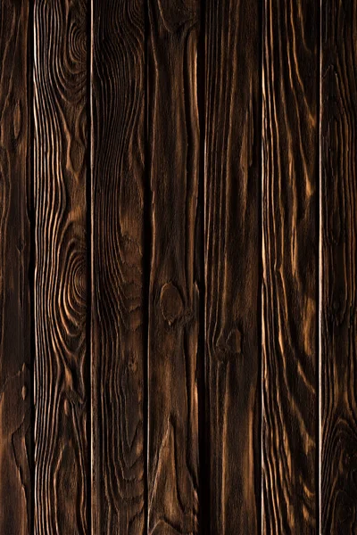 Деревянные доски для забора окрашены в бронзовый цвет — стоковое фото