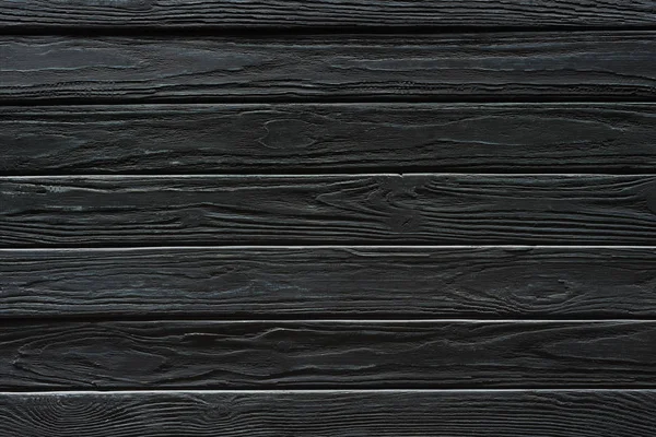 Carpentry template with black wooden planks — Stock Photo
