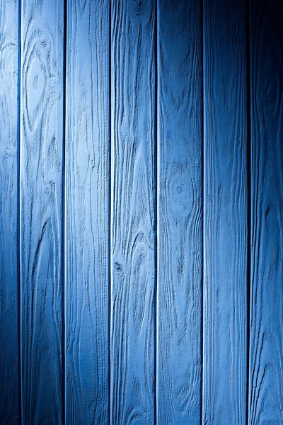 Wooden fence planks background painted in cyan — Stock Photo