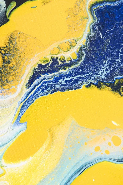Primer plano de textura abstracta con pintura acrílica amarilla y azul - foto de stock
