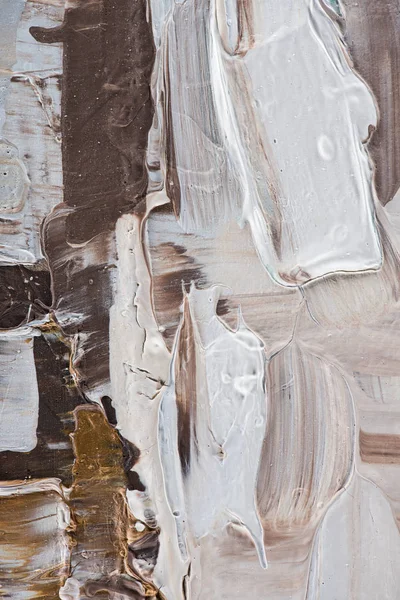 Close up of beige and brown brush strokes of oil paint — Stock Photo