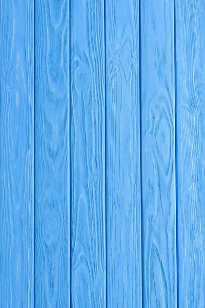 Image plein cadre de planches en bois et fond bleu — Photo de stock