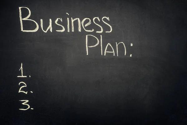 Business plan inscription with stages list on dark chalkboard — Stock Photo