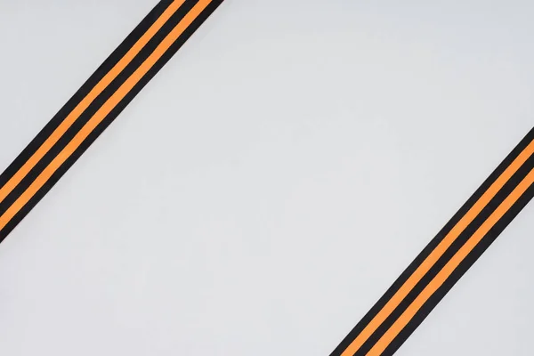 Top view of two st. george ribbons isolated on gray — Stock Photo