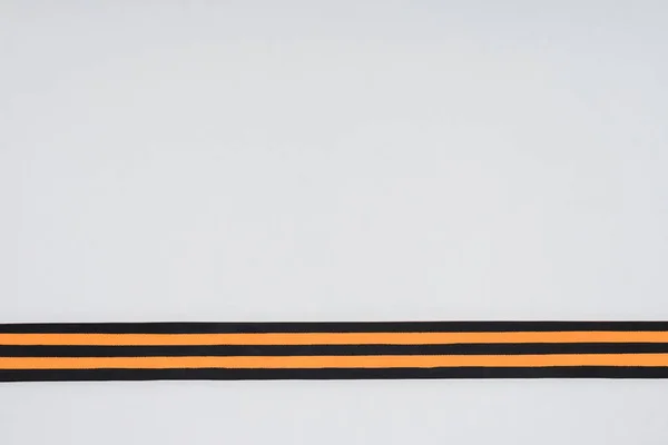 Top view of st. george ribbon isolated on gray — Stock Photo