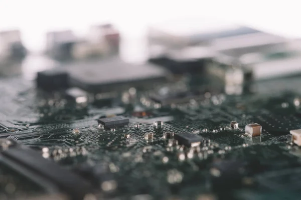 Digital circuit board with microchips and components — Stock Photo