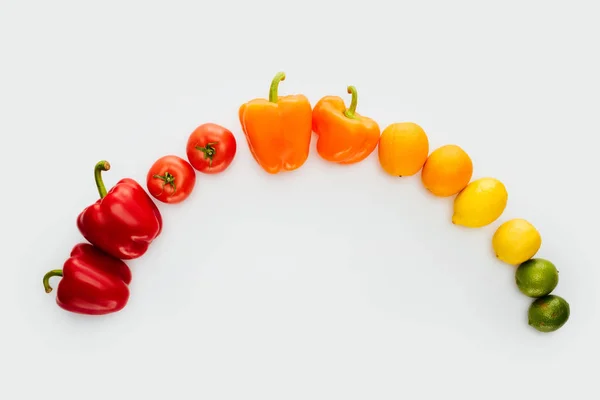 Top view of curve of ripe vegetables and fruits isolated on white — Stock Photo