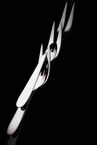 Фруктові вилки з двома зубцями ізольовані на чорному — стокове фото