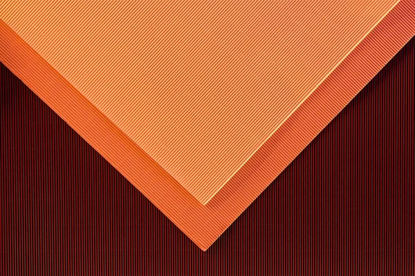 Vista superior de arranjo de folhas de papel coloridas pano de fundo — Fotografia de Stock