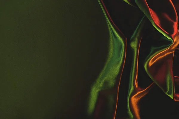 Крупним планом вид темно-зеленої збитої шовкової тканини як фон — стокове фото