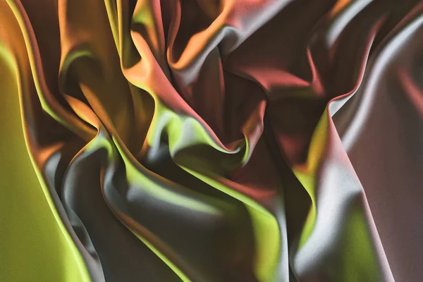 Toned picture of elegant folded silk fabric background — Stock Photo