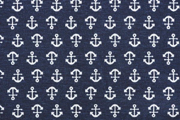 Full frame of blue fabric with white anchors ornament backdrop — Stock Photo