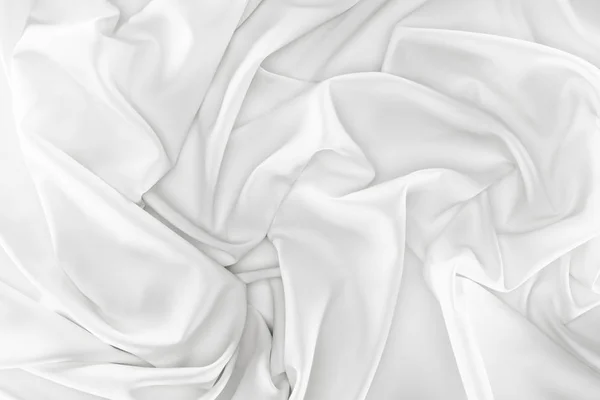 Vista de perto de tecido de seda macia branca como pano de fundo — Fotografia de Stock