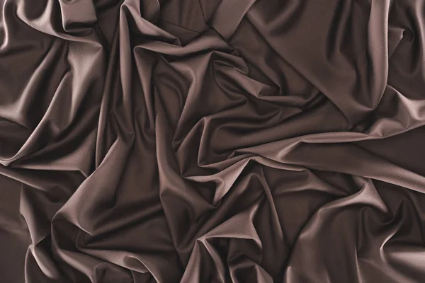 Marco completo de tela de seda oscura plegada como fondo - foto de stock
