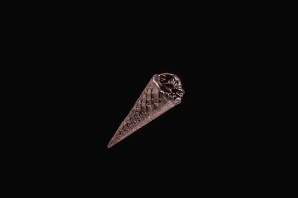 Top view of one black ice cream isolated on black — Stock Photo