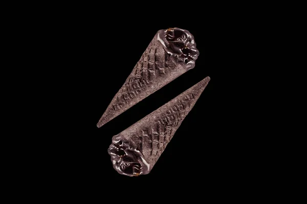 Top view of two black ice cream isolated on black — Stock Photo