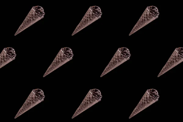 Top view of pattern of chocolate black ice cream isolated on black — Stock Photo