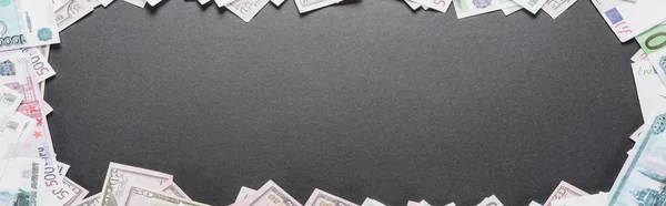 Panoramic shot of empty frame of dollar and euro banknotes on black background with copy space — Stock Photo