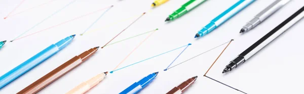 Panoramic shot of colorful felt-tip pens on white background with connected drawn lines, connection and communication concept — Stock Photo