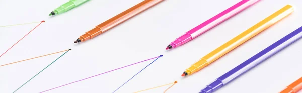 Panoramic shot of colorful felt-tip pens on white background with connected drawn lines, connection and communication concept — Stock Photo