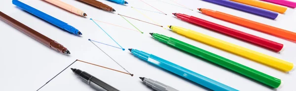 Panoramic shot of multicolored felt-tip pens on white background with connected drawn lines, connection and communication concept — Stock Photo