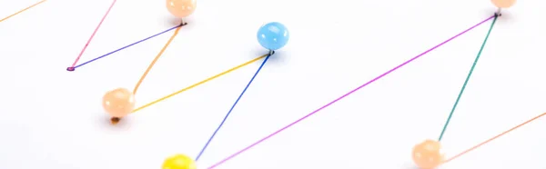 Close up view of colorful connected drawn lines with pins, connection concept — Stock Photo
