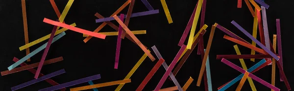 Top view of multicolored abstract lines isolated on black background, connection and communication concept — Stock Photo