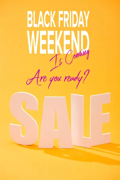 White sale lettering on bright orange background with black Friday weekend illustration — Stock Photo