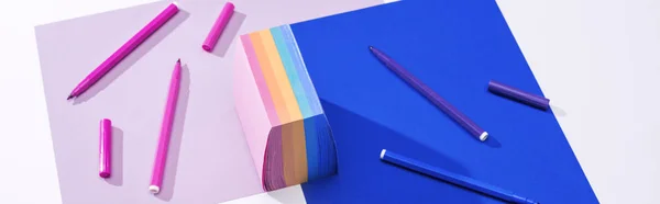 Panoramic shot of papers, sticky notes and felt tip pens on white background — Stock Photo