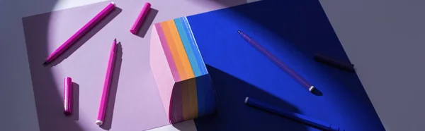 Panoramic shot of papers, sticky notes and felt tip pens on white background — Stock Photo