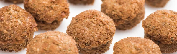 Close up view of delicious fresh cooked falafel balls on white background, panoramic shot — Stock Photo