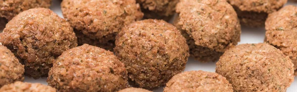 Close up view of fresh cooked falafel balls on white background, panoramic shot — Stock Photo