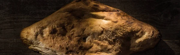 Top view of delicious fresh baked pita on wooden rustic table, panoramic shot — Stock Photo