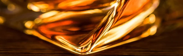 Close up view of brandy in glass, panoramic shot — Stock Photo