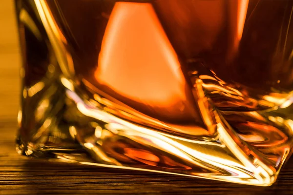 Close up view of brandy in glass on table — Stock Photo