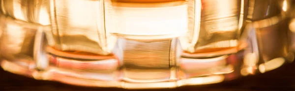 Close up view of brandy in textured glass, panoramic shot — Stock Photo