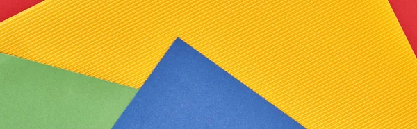 Azul, amarelo, vermelho e verde textura de fundo, tiro panorâmico — Fotografia de Stock