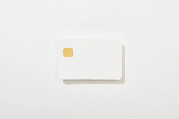 Top view of colorful empty credit card on white background — Stock Photo