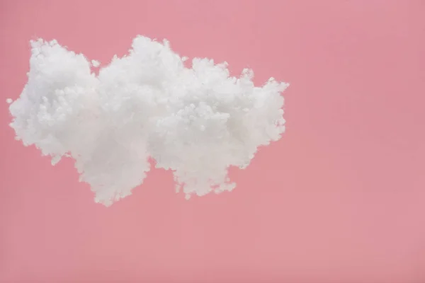 Nuvem macia branca feita de lã de algodão isolada em rosa — Fotografia de Stock