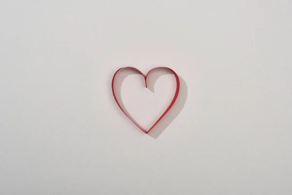 Top view of red paper heart on grey background with copy space — Stock Photo